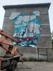 Огромная картина украсила дом в центре Мурманска