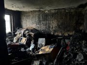 Горел строительный мусор в квартире дома в Гаджиево 